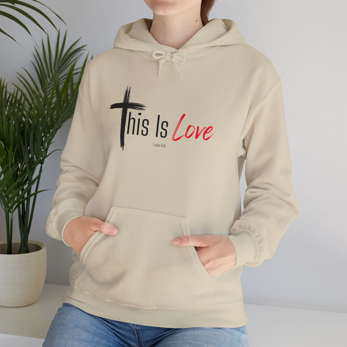 This Is Love Christian Hoodie – 1 John 4:10 Faith Apparel - Unisex Heavy Blend™ Hooded Sweatshirt